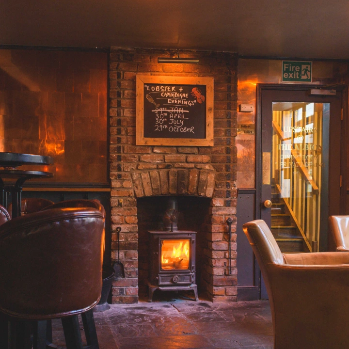 Cosy Pub Fireplace With Wood Burning Stove And Leather Armchairs At The Albion Clifton Village Bristol Boyces Avenue